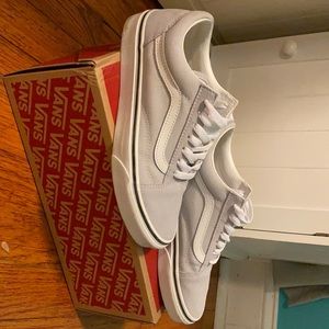 These are women vans in the color grey, size 7